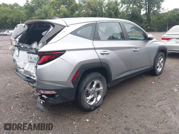 2022 Hyundai Tucson SE z VIN 5NMJACAE2NH080566, wystawiony jako IAAI lot #42875579 z przebiegiem 24 693 mil mil oraz . Historia ofert i sprzedaży dostępna na DreamBid. Obrazek 4.