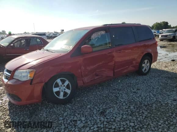 2013 Dodge Grand Caravan SXT with VIN 2C4RDGCG4DR626434, listed as a Copart auction lot 66887225 with 131,941 mi miles and Salvage title. Bid and sale history available at DreamBid. Image 1.