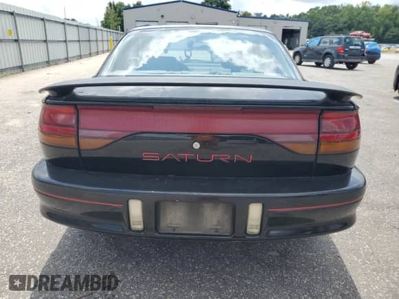 1996 Saturn 2dr Coupe with VIN 1G8ZH1279TZ371071, listed as a Copart auction lot 66602245 with 107,563 mi miles and Salvage title. Bid and sale history available at DreamBid. Image 6.
