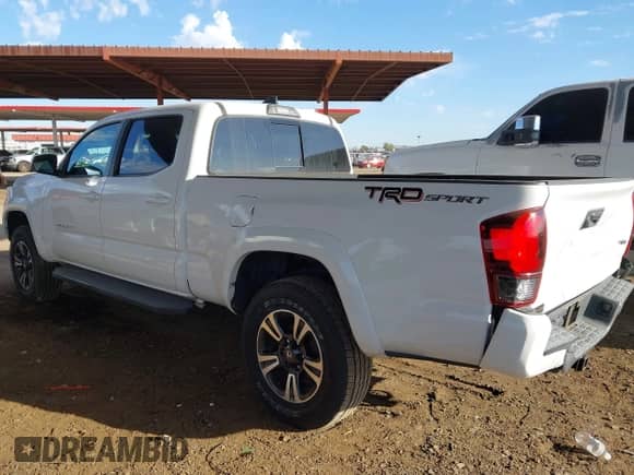 2019 Toyota Tacoma SR5 with VIN 3TMBZ5DN5KM017734, listed as a IAAI auction lot 43384246 with 54,886 mi miles and . Bid and sale history available at DreamBid. Image 3.