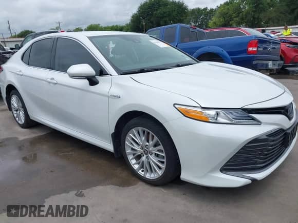 2020 Toyota Camry Hybrid XLE with VIN 4T1F31AK6LU540730, listed as a IAAI auction lot 42368941 with 91,035 mi miles and . Bid and sale history available at DreamBid. Image 1.