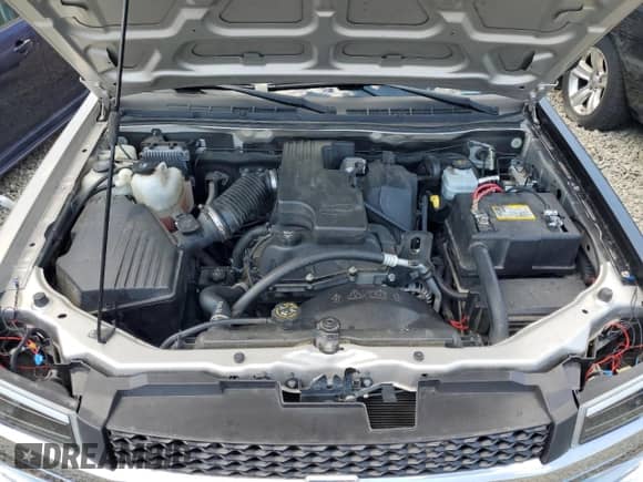 2006 Chevrolet Colorado z VIN 1GCDT138368296500, wystawiony jako Copart lot #63128014 z przebiegiem 76 909 mil mil oraz Szkoda całkowita • Salvage title. Historia ofert i sprzedaży dostępna na DreamBid. Obrazek 11.