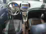 2012 Chevrolet Sonic LTZ с VIN 1G1JE6SH4C4112110, выставлен на аукционе Copart как лот 51121065 с пробегом 141 985 миль миль и Списание • Salvage title. История ставок и продаж доступна на DreamBid. Изображение 8.