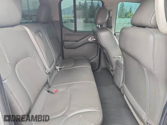 2006 Nissan Frontier LE z VIN 1N6AD07UX6C445030, wystawiony jako Copart lot #63600735 z przebiegiem 195 517 mil mil oraz Szkoda całkowita • Salvage title. Historia ofert i sprzedaży dostępna na DreamBid. Obrazek 10.