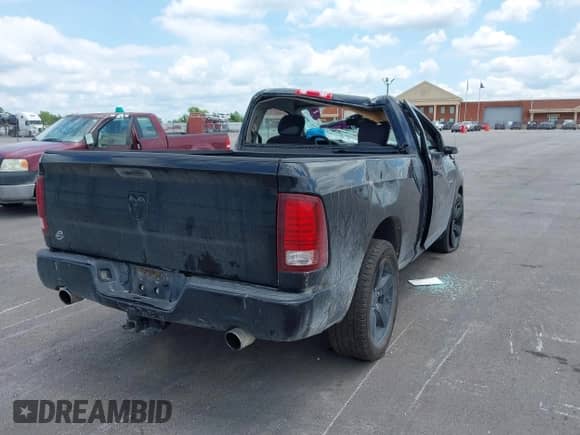 2014 Ram 1500 Express z VIN 3C6JR6ATXEG310088, wystawiony jako IAAI lot #42298290 z przebiegiem 168 308 mil mil oraz . Historia ofert i sprzedaży dostępna na DreamBid. Obrazek 4.