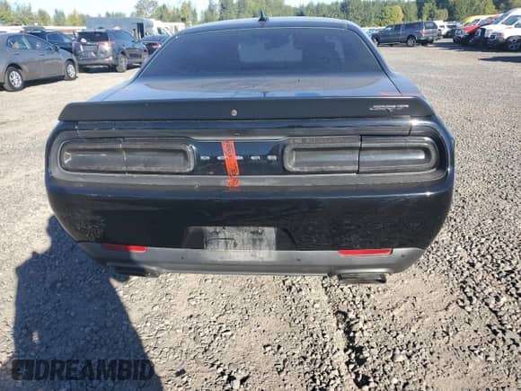 2016 Dodge Challenger SRT Hellcat with VIN 2C3CDZC90GH344499, listed as a Copart auction lot 83858625 with 52,074 mi miles and Salvage title. Bid and sale history available at DreamBid. Image 6.