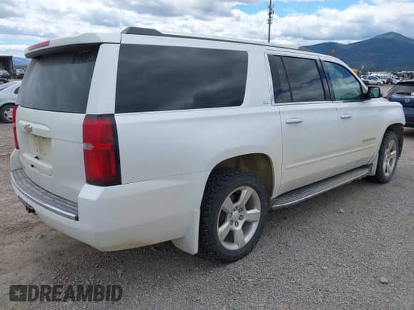 2016 Chevrolet Suburban LTZ with VIN 1GNSKJKC1GR284428, listed as a IAAI auction lot 42687224 with 110,257 mi miles and . Bid and sale history available at DreamBid. Image 4.