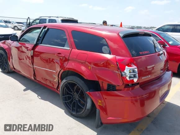 2005 Dodge Magnum RT with VIN 2D4GV58245H622626, listed as a IAAI auction lot 42765406 with 110,372 mi miles and . Bid and sale history available at DreamBid. Image 3.