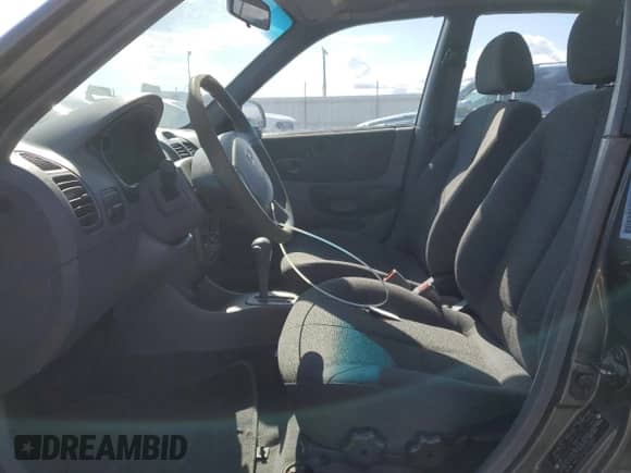 2002 Hyundai Accent GL z VIN KMHCG45C22U336484, wystawiony jako Copart lot #47776665 z przebiegiem 184 346 mil mil oraz Szkoda całkowita • Salvage title. Historia ofert i sprzedaży dostępna na DreamBid. Obrazek 7.