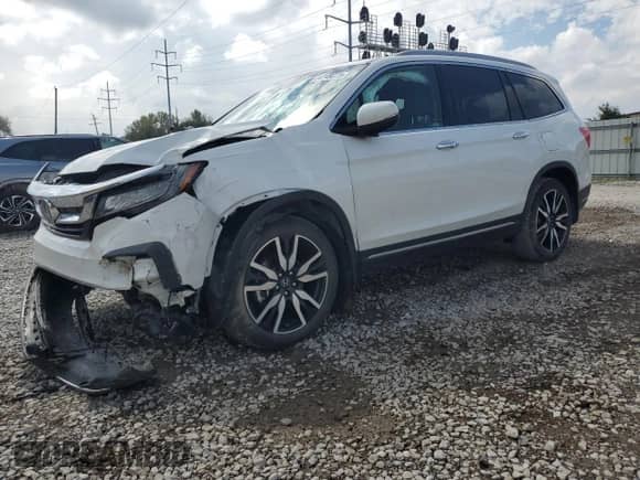 2021 Honda Pilot Touring 8-Passenger with VIN 5FNYF6H98MB062387, listed as a Copart auction lot 84248075 with 63,044 mi miles and Salvage title. Bid and sale history available at DreamBid. Image 1.