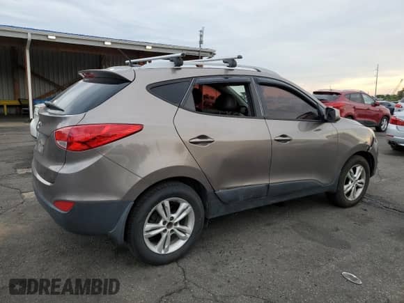 2011 Hyundai Tucson GLS with VIN KM8JU3AC7BU119240, listed as a Copart auction lot 68375445 with 188,541 mi miles and Clean title. Bid and sale history available at DreamBid. Image 3.