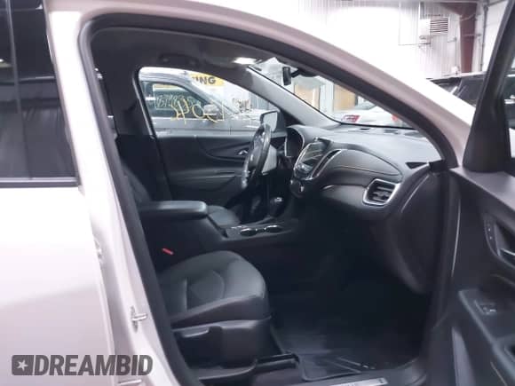 2021 Chevrolet Equinox Premier with VIN 2GNAXXEV4M6128145, listed as a IAAI auction lot 41893046 with 39,492 mi miles and . Bid and sale history available at DreamBid. Image 5.