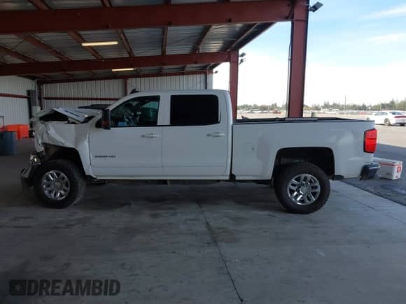 2016 Chevrolet Silverado 2500HD LT z VIN 1GC1KVE88GF247168, wystawiony jako IAAI lot #40907712 z przebiegiem Nie podano mil oraz . Historia ofert i sprzedaży dostępna na DreamBid. Obrazek 14.