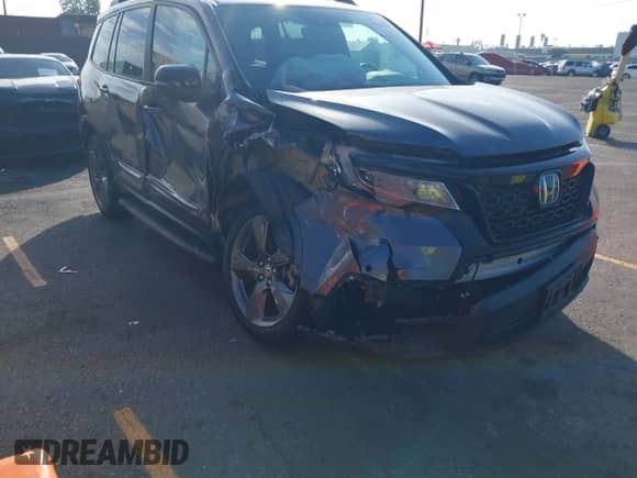 2019 Honda Passport Touring with VIN 5FNYF7H90KB006205, listed as a IAAI auction lot 43291429 with Not provided miles and . Bid and sale history available at DreamBid. Image 1.