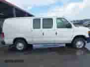 2013 Ford Econoline Cargo Commercial with VIN 1FTNE2EL2DDA97948, listed as a IAAI auction lot 41616701 with 199,739 mi miles and . Bid and sale history available at DreamBid. Image 13.
