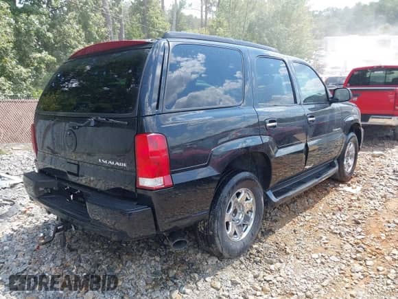 2003 Cadillac Escalade with VIN 1GYEK63NX3R266744, listed as a IAAI auction lot 43132094 with 293,698 mi miles and . Bid and sale history available at DreamBid. Image 4.