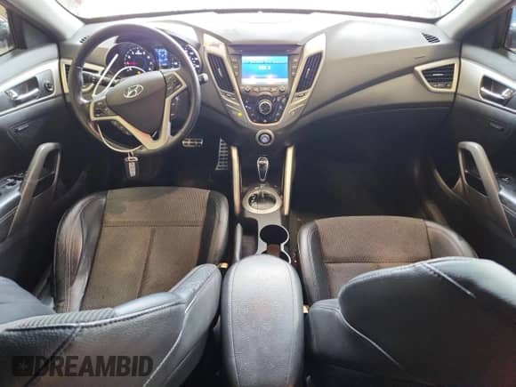 2013 Hyundai Veloster w/Black Int z VIN KMHTC6AD1DU167261, wystawiony jako Copart lot #63744355 z przebiegiem 121 478 mil mil oraz Czysty tytuł • Clean title. Historia ofert i sprzedaży dostępna na DreamBid. Obrazek 8.