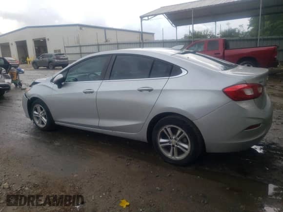 2017 Chevrolet Cruze LT z VIN 1G1BE5SM1H7100367, wystawiony jako Copart lot #65523495 z przebiegiem 183 592 mil mil oraz Szkoda całkowita • Salvage title. Historia ofert i sprzedaży dostępna na DreamBid. Obrazek 2.
