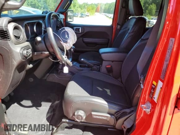 2021 Jeep Wrangler Unlimited 80th Anniversary с VIN 1C4HJXDG6MW659929, выставлен на аукционе Copart как лот 65589515 с пробегом 64 720 миль миль и Списание • Salvage title. История ставок и продаж доступна на DreamBid. Изображение 7.