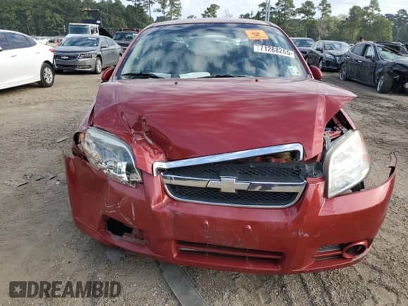 2011 Chevrolet Aveo 2LT с VIN KL1TG5DE0BB166271, выставлен на аукционе Copart как лот 71288265 с пробегом Не указан миль и Списание • Salvage title. История ставок и продаж доступна на DreamBid. Изображение 5.