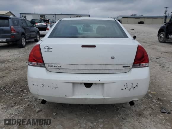 2014 Chevrolet Impala Police Police z VIN 2G1WD5E36E1163240, wystawiony jako Copart lot #41582785 z przebiegiem 133 228 mil mil oraz Szkoda całkowita • Salvage title. Historia ofert i sprzedaży dostępna na DreamBid. Obrazek 6.