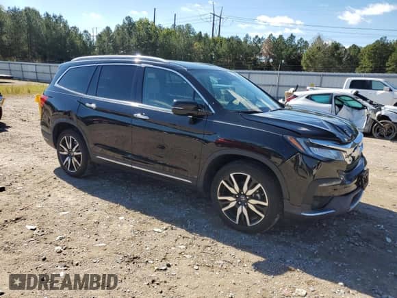 2019 Honda Pilot Elite с VIN 5FNYF6H0XKB088987, выставлен на аукционе Copart как лот 86602645 с пробегом 84 941 миль миль и Списание • Salvage title. История ставок и продаж доступна на DreamBid. Изображение 4.