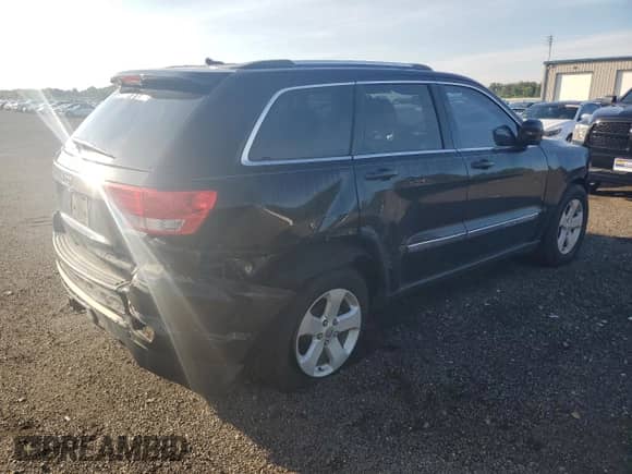 2012 Jeep Grand Cherokee Laredo с VIN 1C4RJEAT5CC277496, выставлен на аукционе Copart как лот 66572555 с пробегом 139 328 миль миль и Чистый • Clean title. История ставок и продаж доступна на DreamBid. Изображение 3.