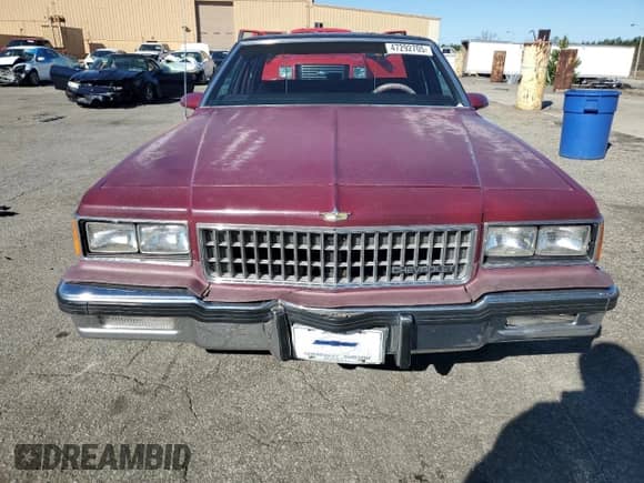 1986 Chevrolet Caprice с VIN 1G1BN69H0GX204734, выставлен на аукционе Copart как лот 47292705 с пробегом 24 345 миль миль и Списание • Salvage title. История ставок и продаж доступна на DreamBid. Изображение 5.