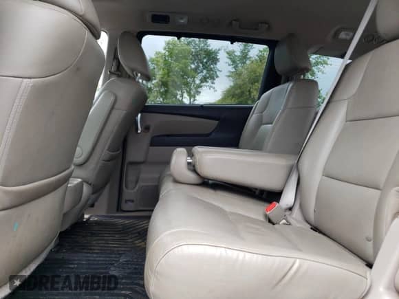 2014 Honda Odyssey Touring с VIN 5FNRL5H90EB030588, выставлен на аукционе Copart как лот 69114835 с пробегом 126 659 миль миль и Чистый • Clean title. История ставок и продаж доступна на DreamBid. Изображение 11.