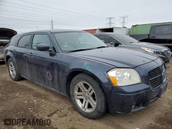 2006 Dodge Magnum R/T with VIN 2D4GV57276H122690, listed as a Copart auction lot 44357495 with 129,569 mi miles and Salvage title. Bid and sale history available at DreamBid. Image 4.
