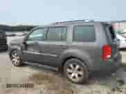 2015 Honda Pilot Touring с VIN 5FNYF3H96FB011875, выставлен на аукционе Copart как лот 59057085 с пробегом 165 328 миль миль и Списание • Salvage title. История ставок и продаж доступна на DreamBid. Изображение 2.