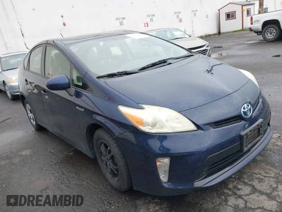 2013 Toyota Prius One with VIN JTDKN3DU5D1696220, listed as a IAAI auction lot 41656428 with 238,910 mi miles and . Bid and sale history available at DreamBid. Image 1.