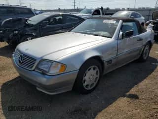 1995 Mercedes-Benz SL 5.0L with VIN WDBFA67E3SF114049, listed as a Copart auction lot 69282925 with 68,294 mi miles and Salvage title. Bid and sale history available at DreamBid. Image 1.