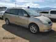 2005 Toyota Sienna XLE z VIN 5TDBA22C95S038095, wystawiony jako Copart lot #84427715 z przebiegiem 201 341 mil mil oraz Czysty tytuł • Clean title. Historia ofert i sprzedaży dostępna na DreamBid. Obrazek 4.