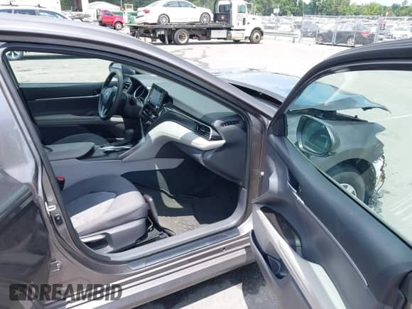 2022 Toyota Camry Hybrid LE with VIN 4T1C31AK9NU036999, listed as a IAAI auction lot 42741455 with 68,970 mi miles and . Bid and sale history available at DreamBid. Image 5.