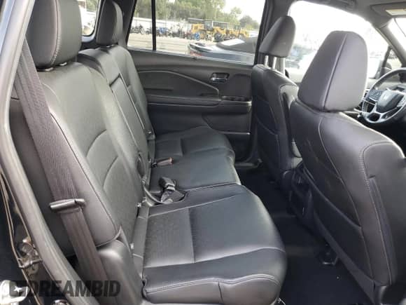 2020 Honda Passport EX-L with VIN 5FNYF7H57LB002571, listed as a Copart auction lot 53063375 with 56,866 mi miles and Salvage title. Bid and sale history available at DreamBid. Image 11.