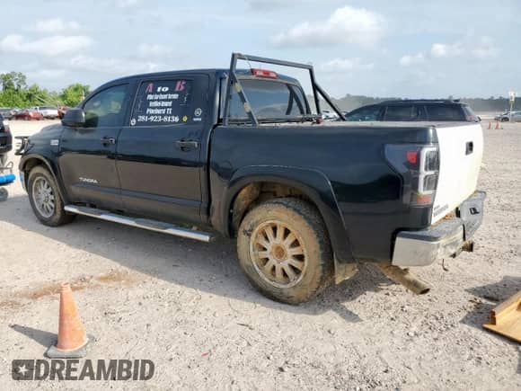 2012 Toyota Tundra with VIN 5TFEY5F12CX121183, listed as a Copart auction lot 57284005 with 381,527 mi miles and Clean title. Bid and sale history available at DreamBid. Image 2.