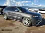 2014 Jeep Grand Cherokee Summit с VIN 1C4RJFJT4EC408510, выставлен на аукционе Copart как лот 82128615 с пробегом 91 710 миль миль и Списание • Salvage title. История ставок и продаж доступна на DreamBid. Изображение 4.