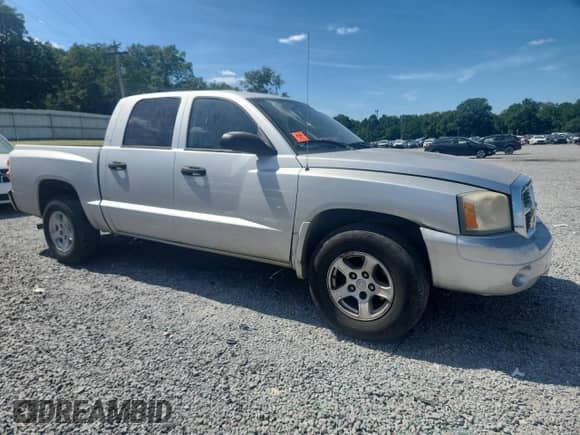 2007 Dodge Dakota SLT с VIN 1D7HE48P17S164732, выставлен на аукционе Copart как лот 80075525 с пробегом 230 632 миль миль и Списание • Salvage title. История ставок и продаж доступна на DreamBid. Изображение 4.