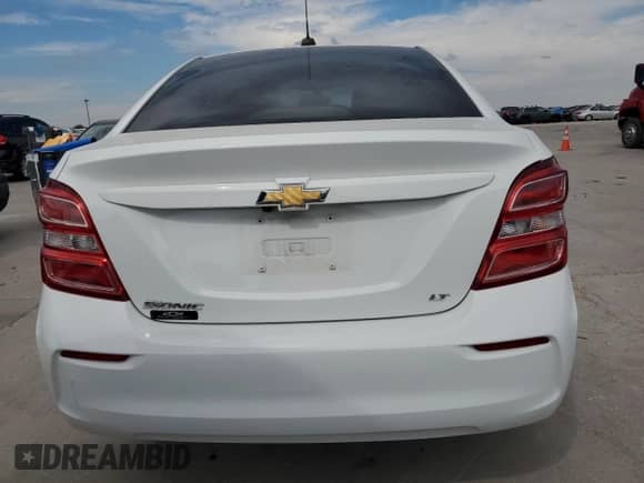 2019 Chevrolet Sonic LT с VIN 1G1JD5SB5K4146029, выставлен на аукционе Copart как лот 86774255 с пробегом 63 617 миль миль и Списание • Salvage title. История ставок и продаж доступна на DreamBid. Изображение 6.