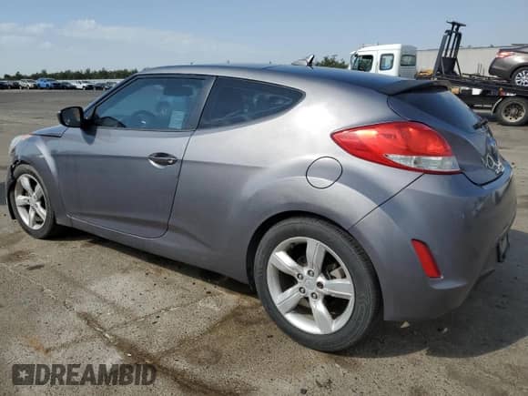 2013 Hyundai Veloster w/Black Int z VIN KMHTC6AD9DU095127, wystawiony jako Copart lot #70422785 z przebiegiem 188 309 mil mil oraz Szkoda całkowita • Salvage title. Historia ofert i sprzedaży dostępna na DreamBid. Obrazek 2.