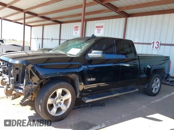 2015 Chevrolet Silverado 1500 LT z VIN 1GCRCREC2FZ282510, wystawiony jako IAAI lot #43355186 z przebiegiem 111 148 mil mil oraz . Historia ofert i sprzedaży dostępna na DreamBid. Obrazek 14.