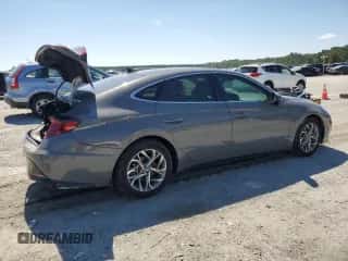 2023 Hyundai Sonata SEL z VIN KMHL14JAXPA311699, wystawiony jako Copart lot #70004705 z przebiegiem 48 733 mil mil oraz Szkoda całkowita • Salvage title. Historia ofert i sprzedaży dostępna na DreamBid. Obrazek 3.