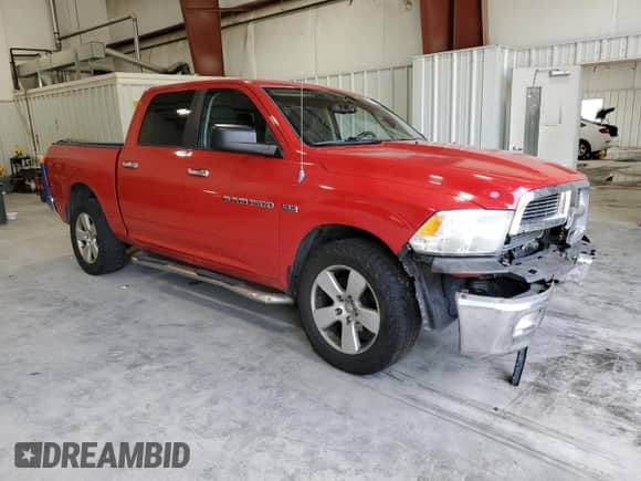 2011 Ram 1500 Big Horn with VIN 1D7RV1CTXBS671953, listed as a Copart auction lot 85552095 with 185,894 mi miles and Salvage title. Bid and sale history available at DreamBid. Image 4.