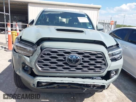 2023 Toyota Tacoma SR5 z VIN 3TYAZ5CN2PT034757, wystawiony jako IAAI lot #42921951 z przebiegiem 20 819 mil mil oraz . Historia ofert i sprzedaży dostępna na DreamBid. Obrazek 13.