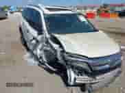 2021 Honda Pilot Touring 7-Passenger z VIN 5FNYF5H62MB011807, wystawiony jako IAAI lot #43367010 z przebiegiem Nie podano mil oraz . Historia ofert i sprzedaży dostępna na DreamBid. Obrazek 6.