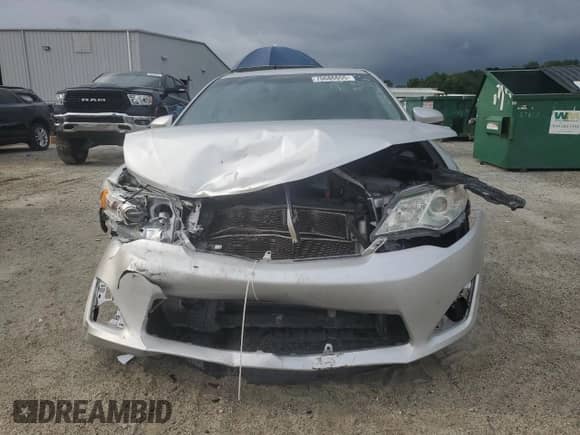 2012 Toyota Camry LE z VIN 4T1BD1FK1CU013215, wystawiony jako Copart lot #70686655 z przebiegiem Nie podano mil oraz Szkoda całkowita • Salvage title. Historia ofert i sprzedaży dostępna na DreamBid. Obrazek 5.