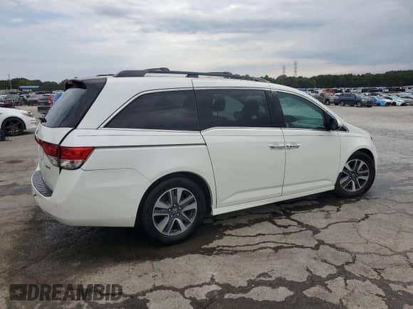 2015 Honda Odyssey Touring Elite with VIN 5FNRL5H95FB094806, listed as a Copart auction lot 70348775 with 156,141 mi miles and Salvage title. Bid and sale history available at DreamBid. Image 3.