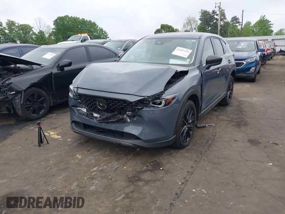 2022 Mazda CX-5 S Preferred z VIN JM3KFBCM9N0542679, wystawiony jako IAAI lot #42107215 z przebiegiem 57 018 mil mil oraz . Historia ofert i sprzedaży dostępna na DreamBid. Obrazek 2.