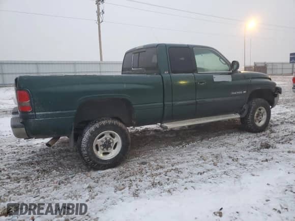 2001 Dodge 2500 with VIN 1B7KF23W31J592363, listed as a Copart auction lot 83013194 with 237,338 mi miles and Clean title. Bid and sale history available at DreamBid. Image 3.